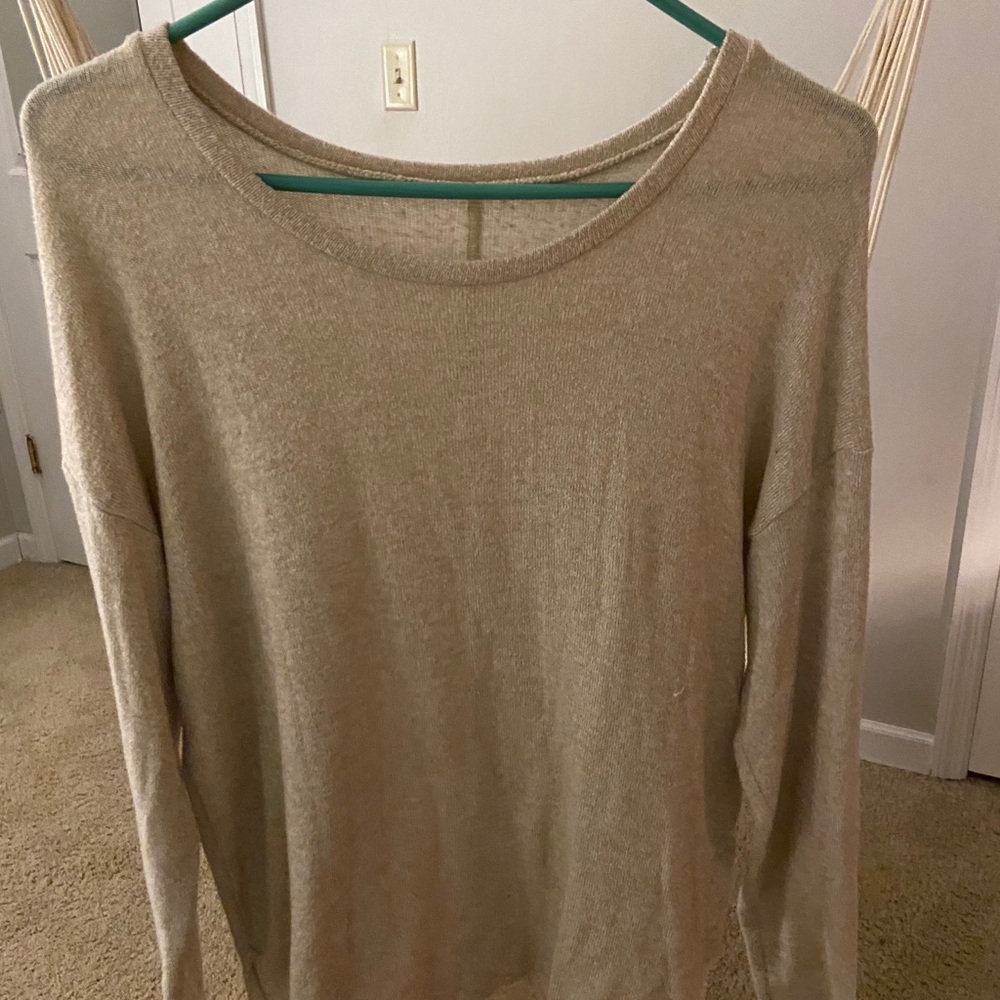 Long sleeve, plain cream colored shirt
